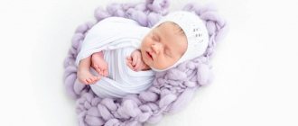 новорожденный ребенок сладко спит