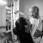 family shooting in the bathroom with children at home
